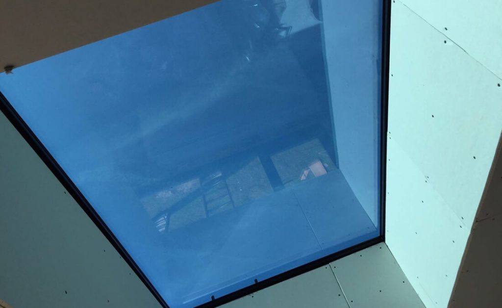 Flat rooflight blue glass